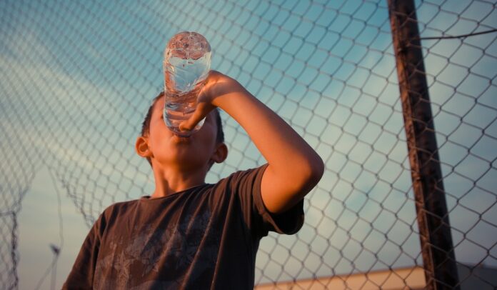 boy drinking water