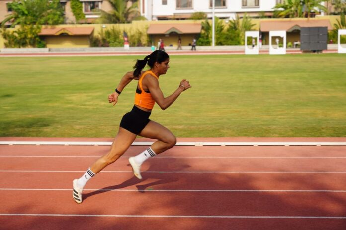 Shaili Singh, a known jumper practicing on the training ground